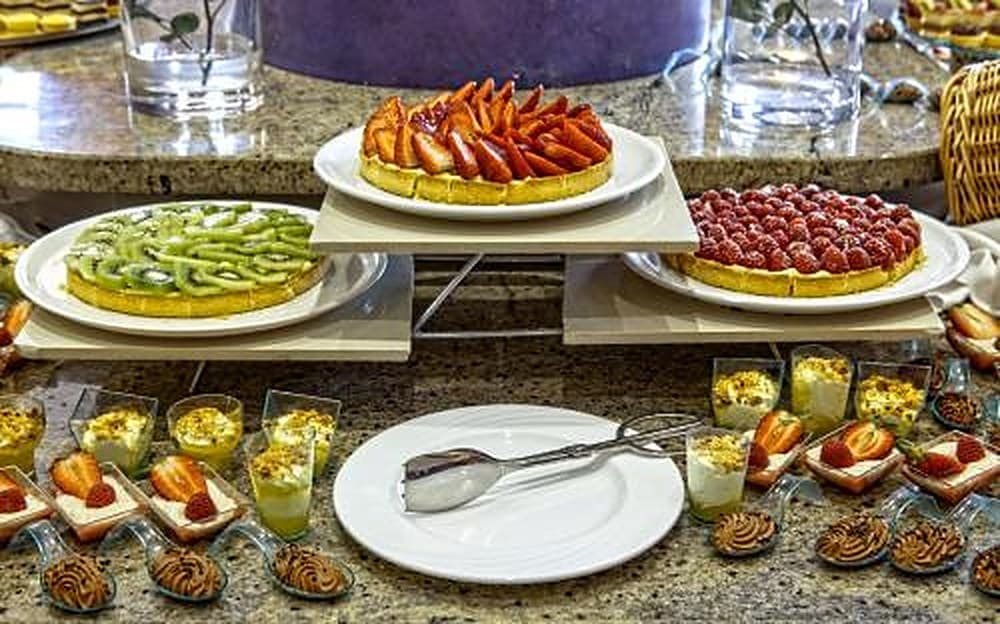 Dessert buffet with fruit tarts and pastries